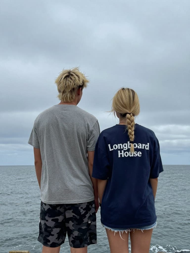 Smartphone photo taken from behind a young couple, a man and a woman…