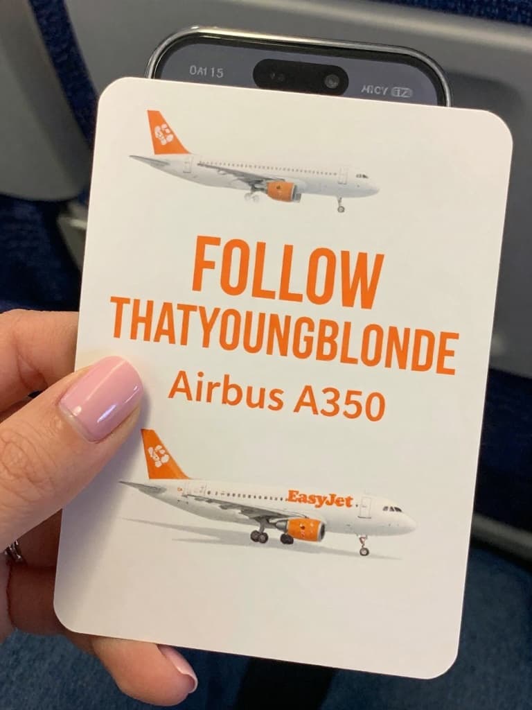 Smartphone photo of a custom-made airline safety card, designed to…