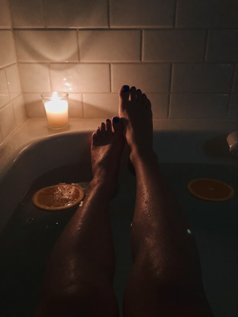 Smartphone photo taken from a first-person POV of a person's legs and…