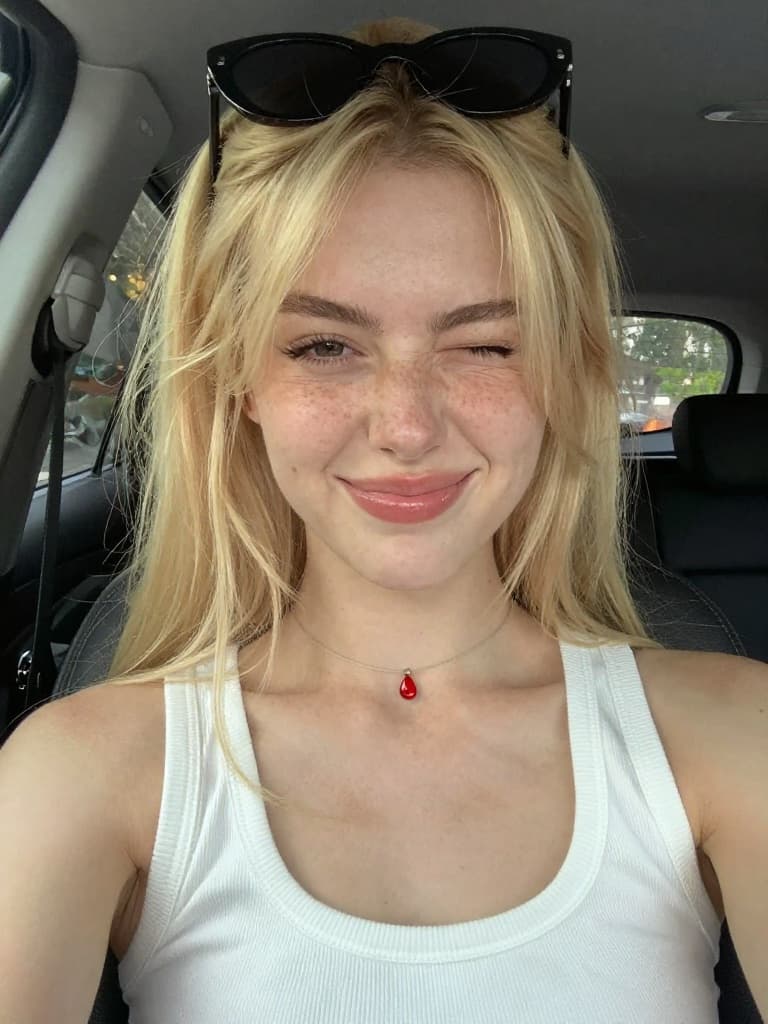 Smartphone selfie of a beautiful young caucasian woman in her early…