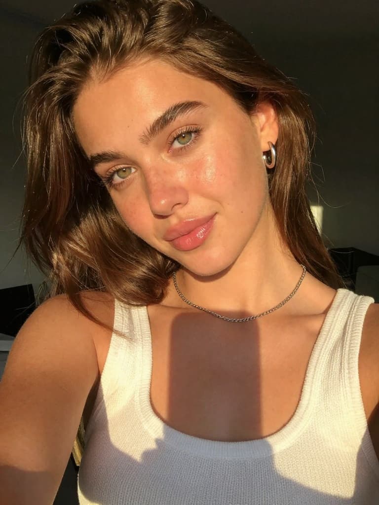 Smartphone selfie of a conventionally attractive young caucasian…
