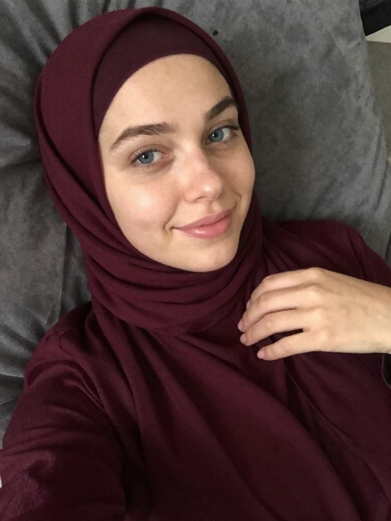 Slightly soft-focus smartphone selfie of a beautiful young caucasian…